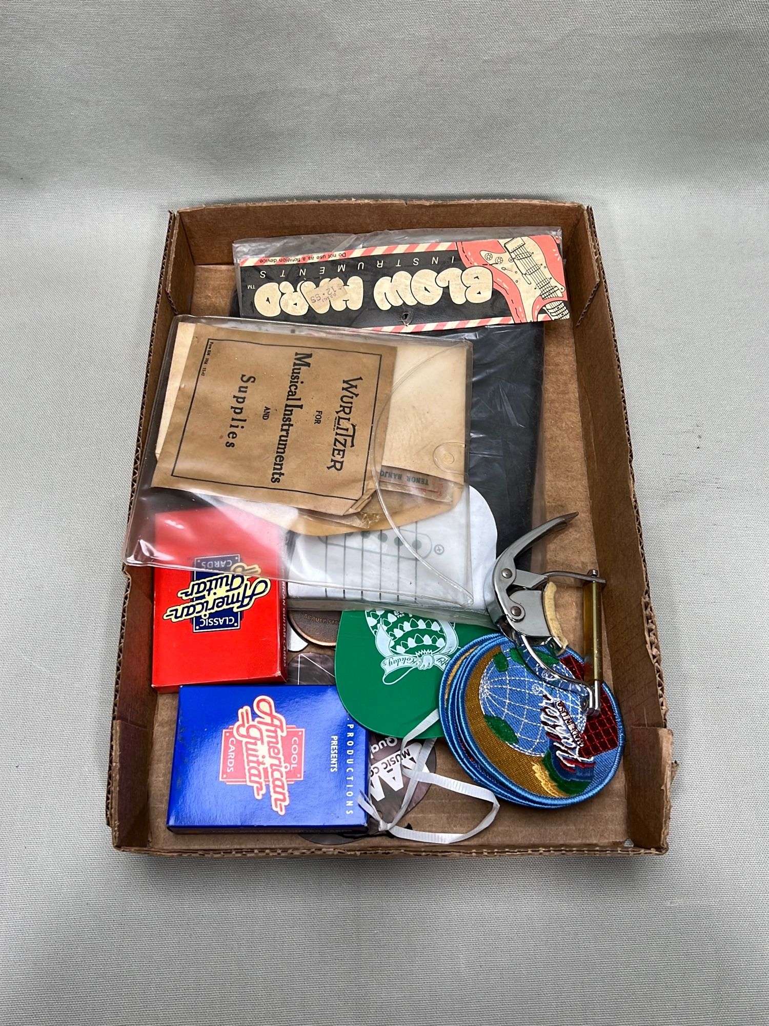 Appraisal: Lot guitar cards capo etcLot guitar cards capo etc All