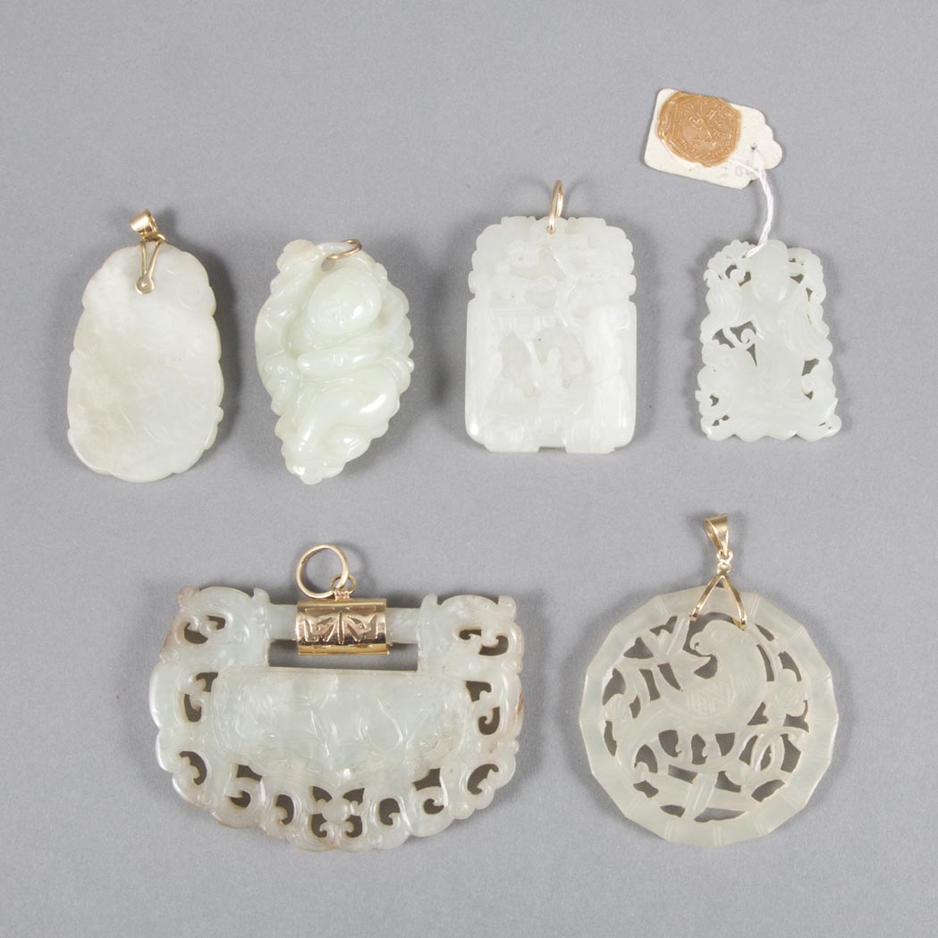 Appraisal: Group of Four Chinese Celadon Jade Pendants and Two Chinese