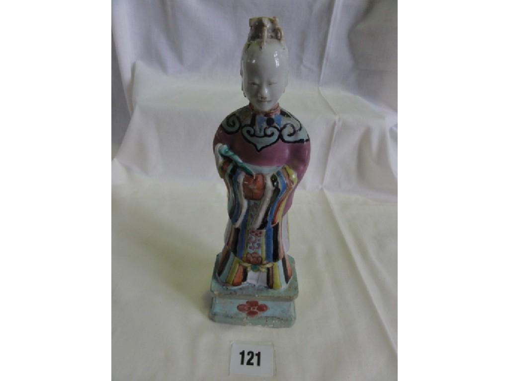 Appraisal: An early th century Chinese polychrome painted figure of a