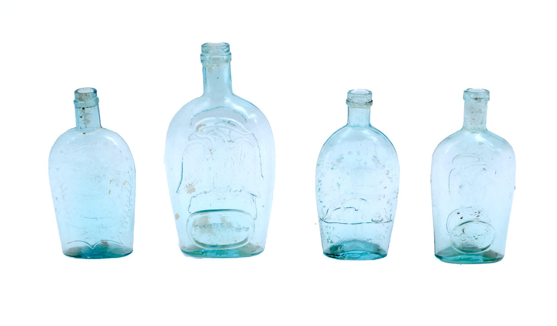 Appraisal: ANTIQUE AQUAMARINE HISTORICAL FLASKS An assembled collection of flasks all