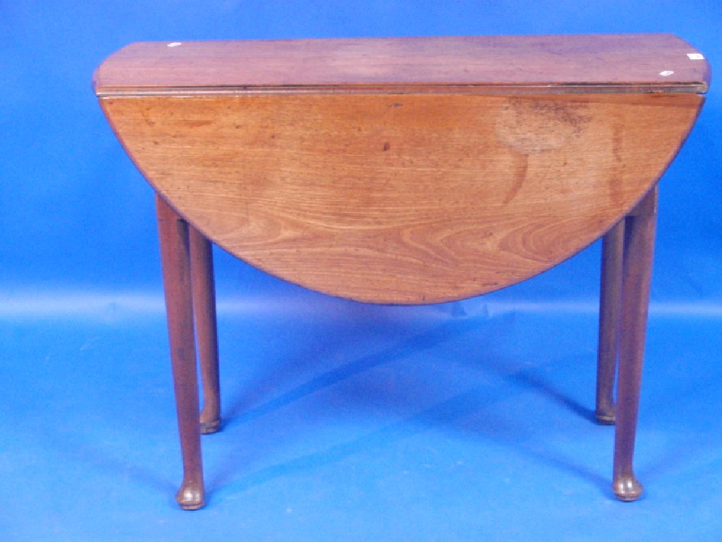 Appraisal: A Georgian mahogany oval fall leaf table with plain top