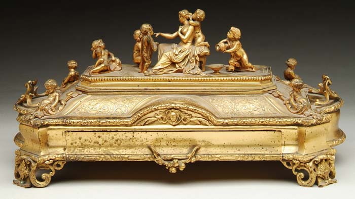 Appraisal: BRONZE ORNATE INKWELL STAND Hinge top stand in ornate bronze