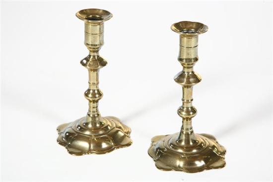 Appraisal: PAIR OF BRASS CANDLESTICKS English mid th century Petal bases