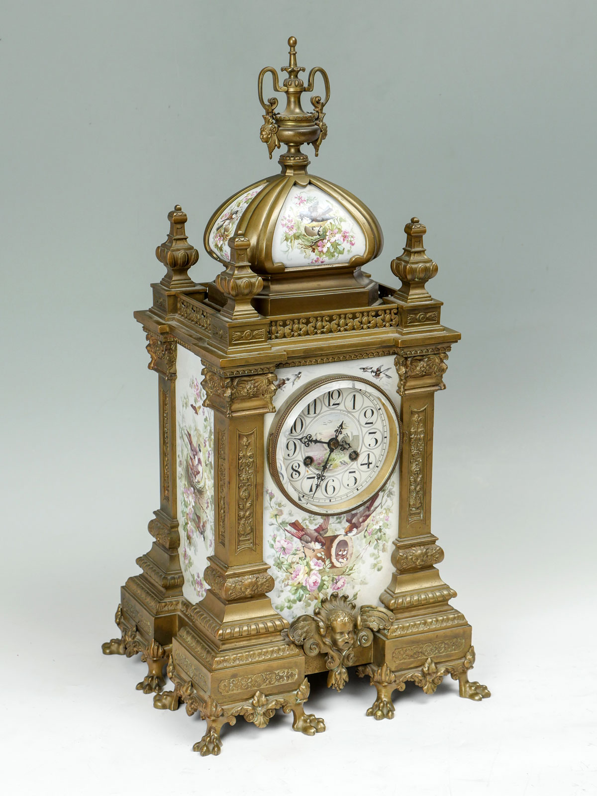 Appraisal: FRENCH CHEVALIER CLOCK WITH PORCELAIN PANELS INSERTS Heavy French bronze