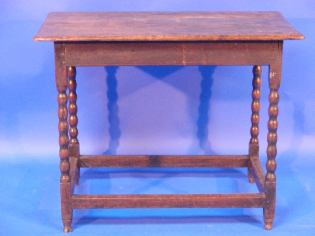 Appraisal: A late th Century oak side table the rectangular top