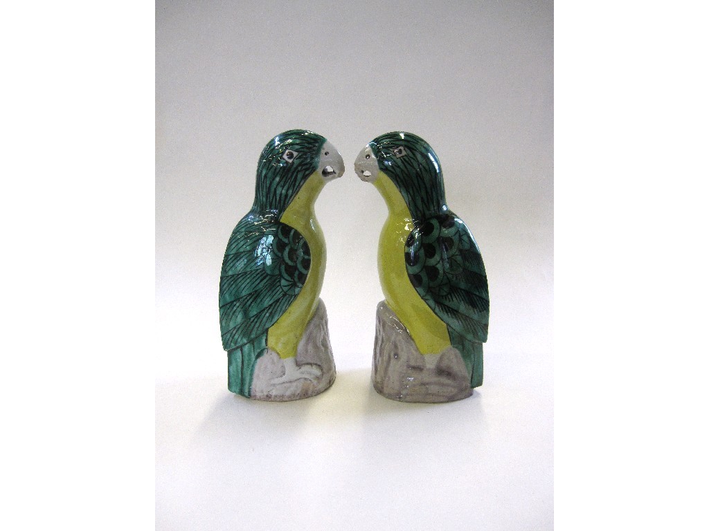 Appraisal: Pair of oriental pottery figures of parrots