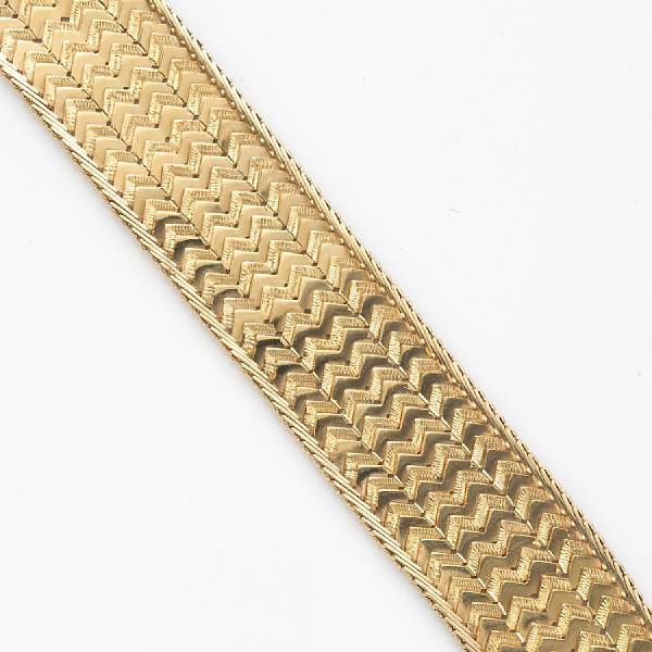 Appraisal: An eighteen karat gold wide strap bracelet Italian weighing gr