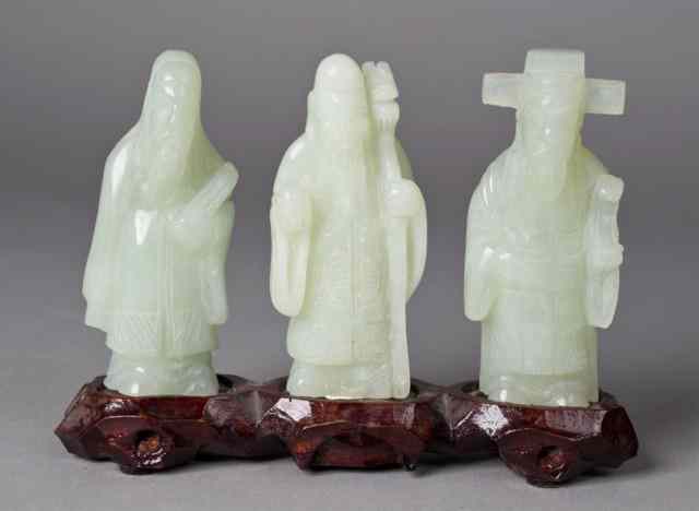 Appraisal: Chinese Carved Jade EldersFinely carved to depict three elders on