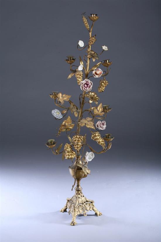 Appraisal: CONTINENTAL GILT-METAL AND PORCELAIN SEVEN-LIGHT CANDELABRUM late th century Grape-vine