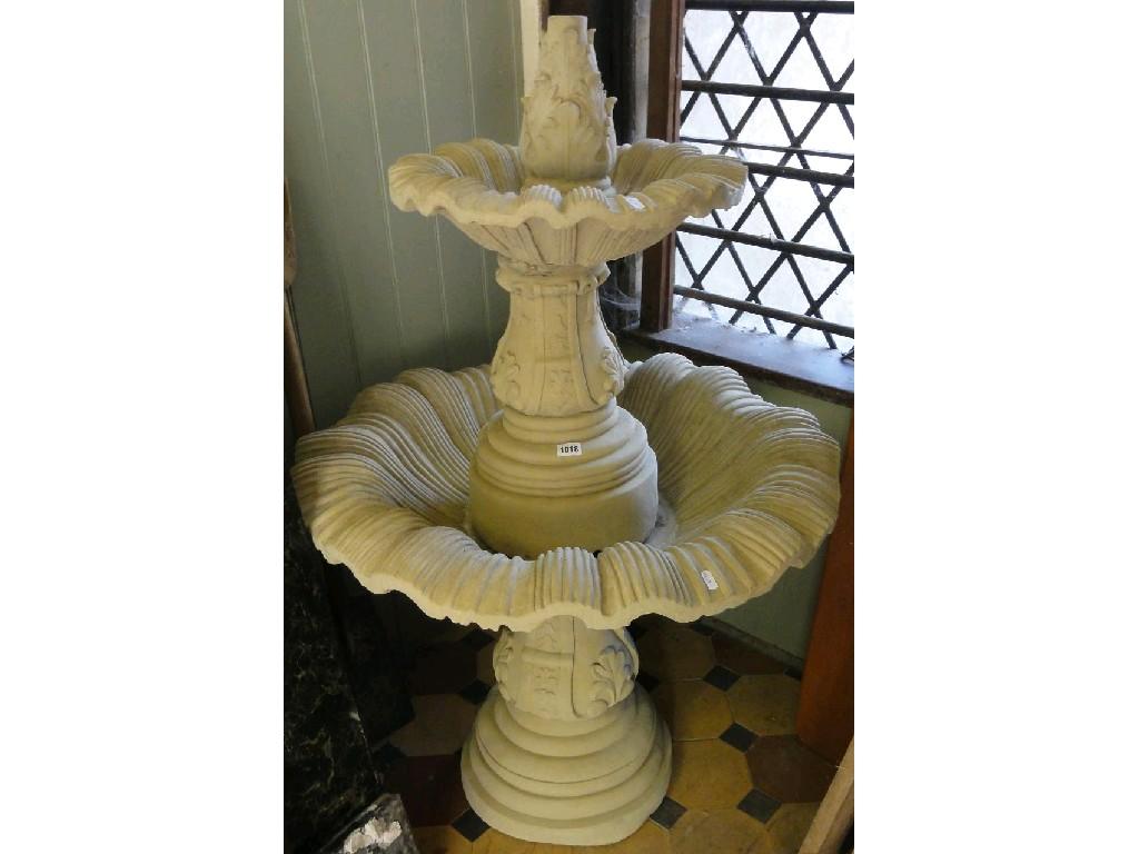 Appraisal: A composition stone garden sectional water fountain with graduated shell