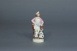 Appraisal: A Staffordshire figure of a boy with sheepdog cm