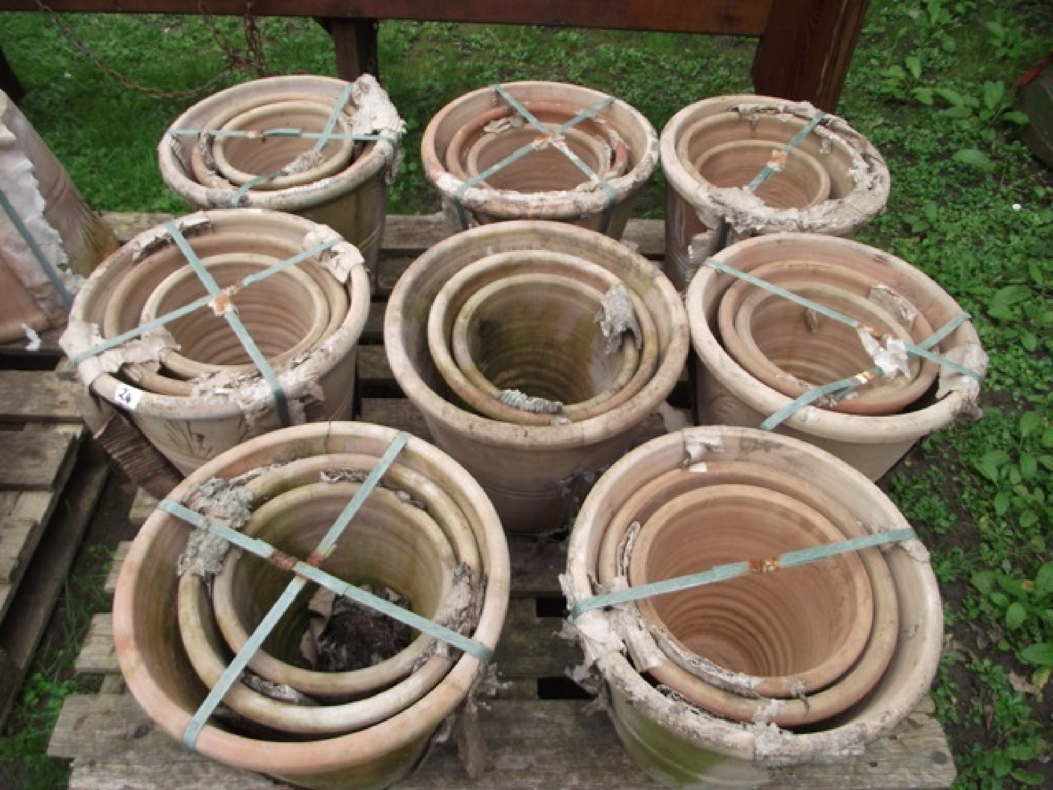 Appraisal: Eight sets of three graduated contemporary terracotta flower pots of