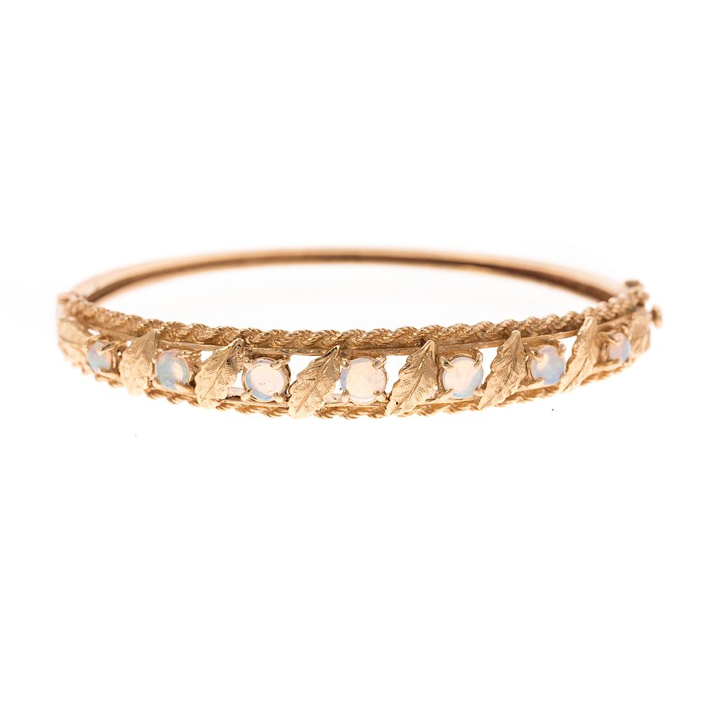 Appraisal: A Ladies Opal Bangle Bracelet in K K yellow gold