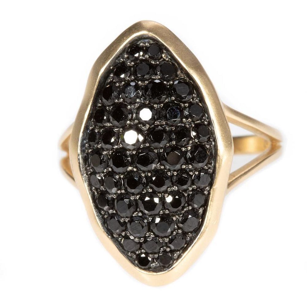 Appraisal: Black spinel and k gold ring the navette shaped ring