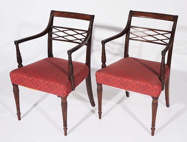 Appraisal: A PAIR OF EARLY TH CENTURY MAHOGANY ARMCHAIRS on tapering