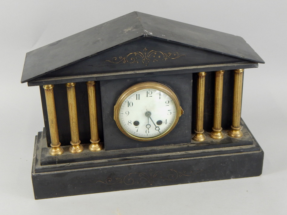 Appraisal: A late thC French portico shaped black slate clock with