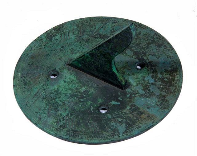 Appraisal: A FOUR INCH METAL SUNDIAL attributed to J Abraham Bartlet