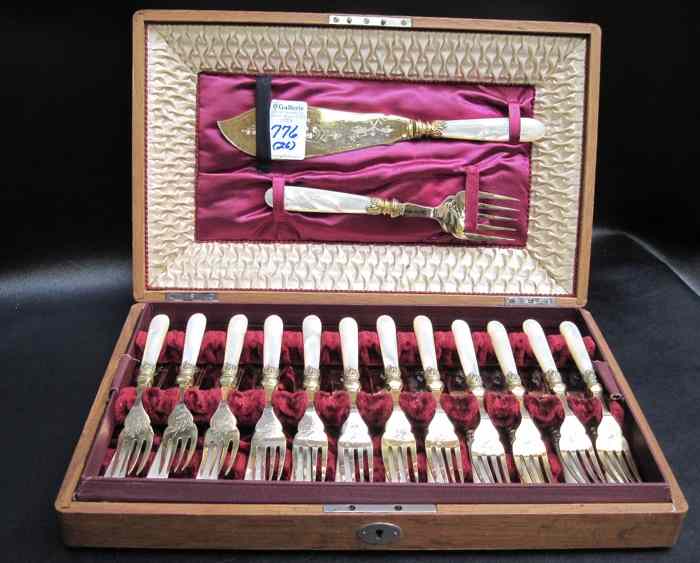 Appraisal: FRENCH TWENTY-SIX PIECE FISH SET gold plated engraved master serving