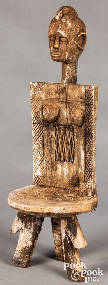 Appraisal: East African carved chair with figural bust East African carved