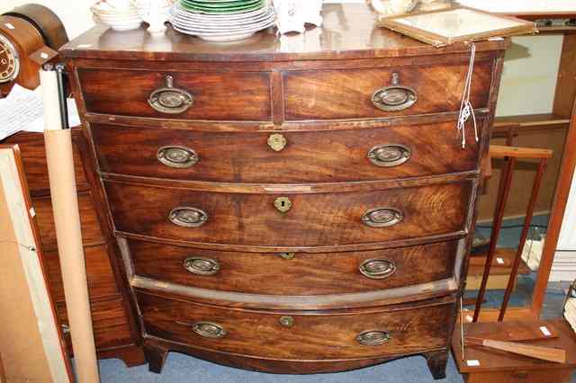 Appraisal: A TH CENTURY MAHOGANY BOW FRONTED CHEST of two short