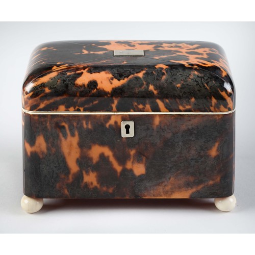 Appraisal: A Victorian tortoiseshell tea caddy with silver escutcheon and tablet