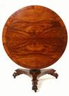 Appraisal: CENTER TABLE - Circa round figured mahogany tilt-top center table