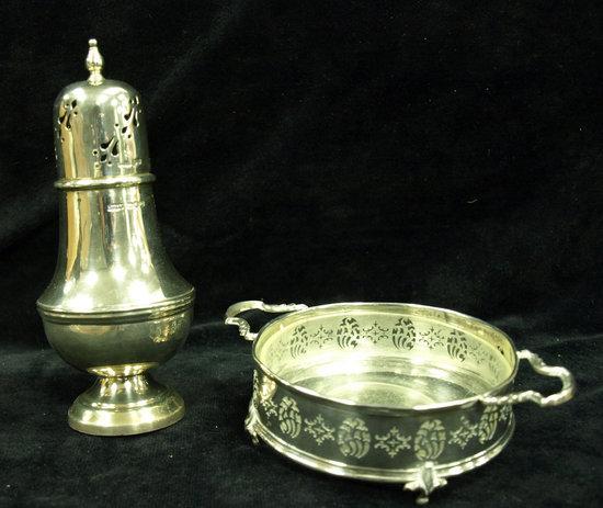 Appraisal: A pear shaped sugar caster with pierced cover on a