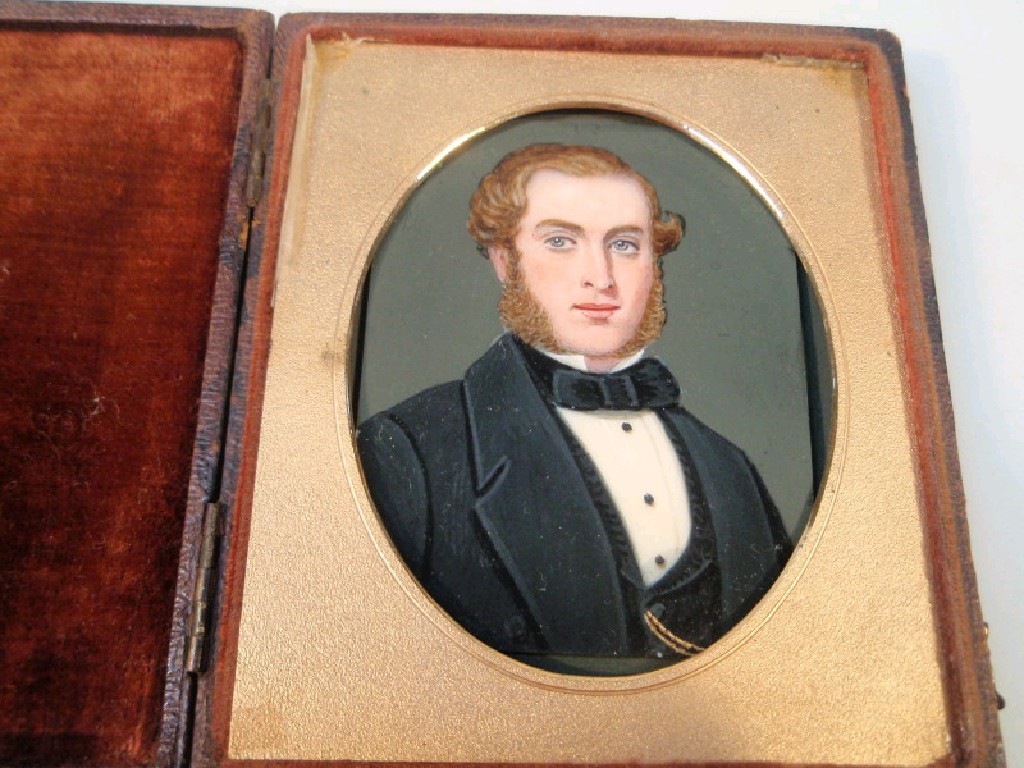 Appraisal: A thC portrait on slate in a daguerreotype leather case