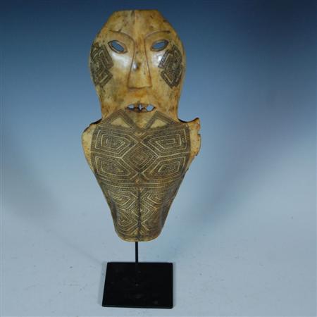 Appraisal: Ethnographic Interest An early th century carved bone figure carved