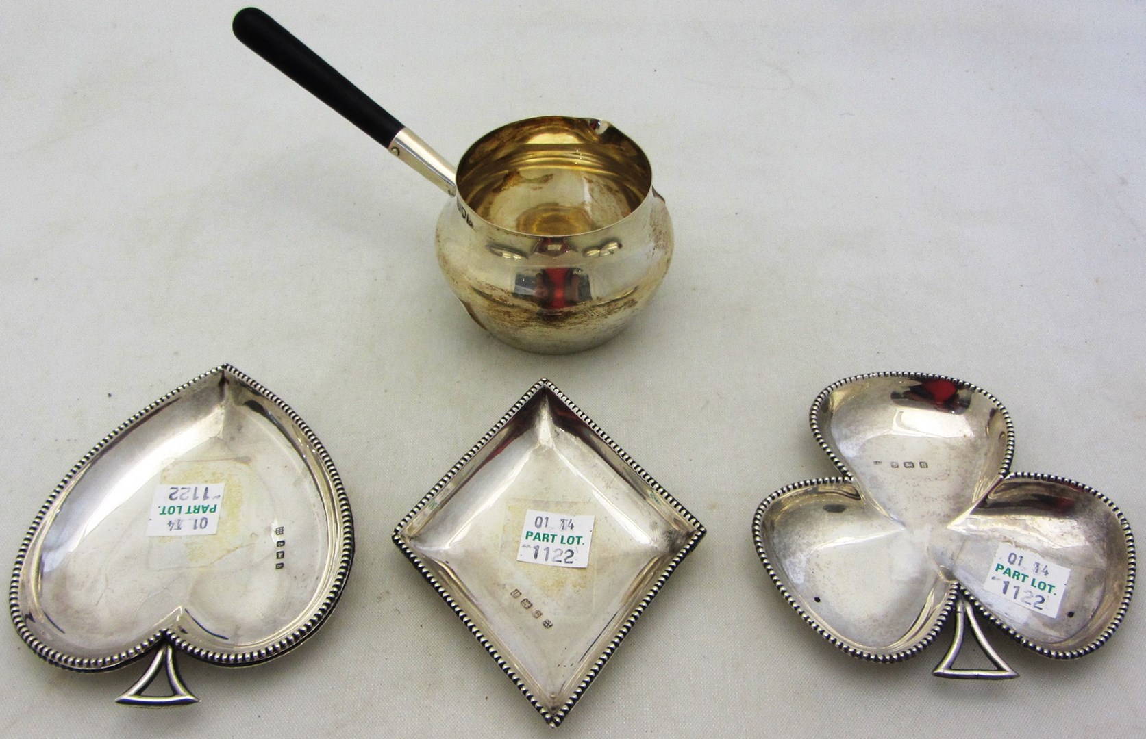 Appraisal: A set of four silver dishes each designed as a