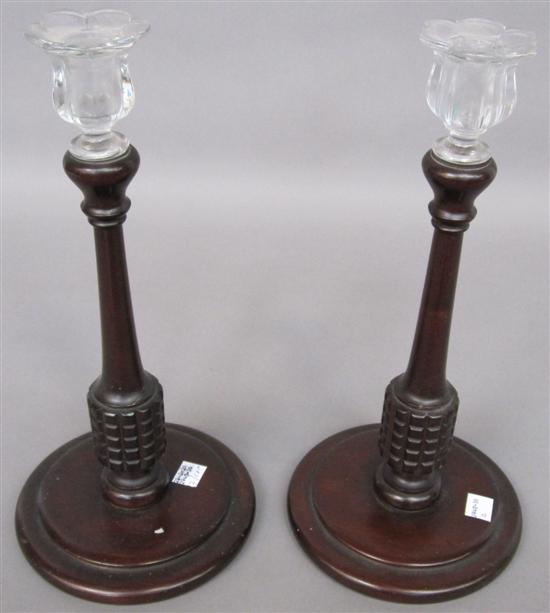 Appraisal: PAIR ANTIQUE CANDLESTICKS Turned mahogany with glass candle holders H