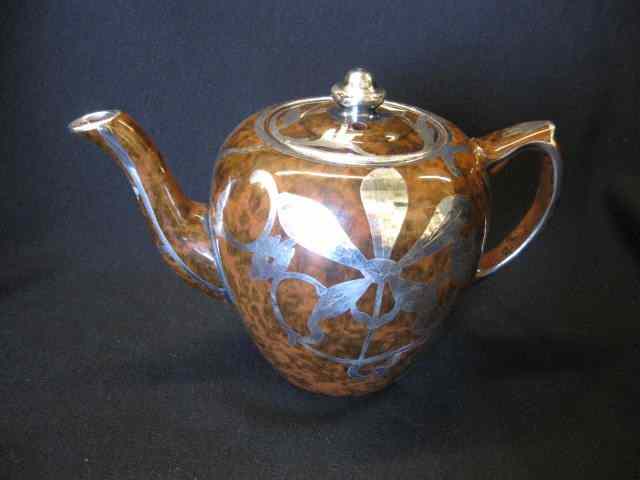 Appraisal: Silver Overlay English Porcelain Teapot floral on brown '' tall