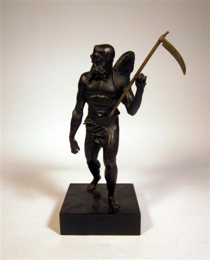 Appraisal: Continental figure of SaturnBronze dark brown patina depicting The standing