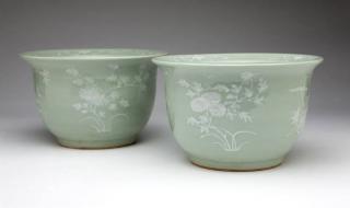 Appraisal: A pair of Chinese celadon Mid- th century each with