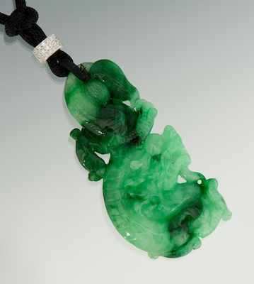 Appraisal: A Carved Natural Color Jadeite and Diamond Dragon Pendant Carved