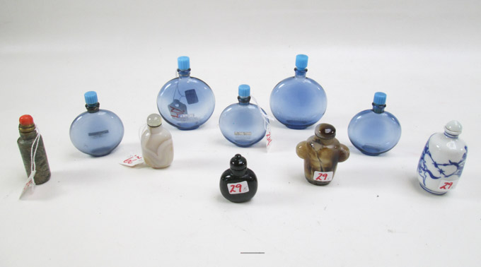 Appraisal: FIVE CHINESE XING DYNASTY SNUFF BOTTLES cylindrical stone bottle with