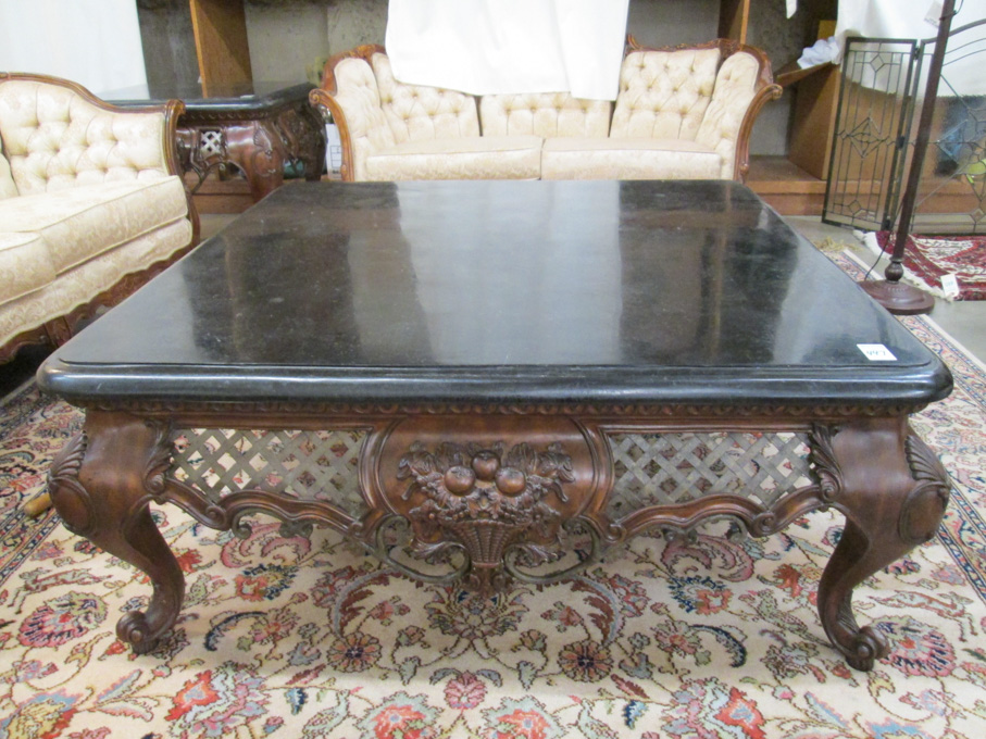 Appraisal: LOUIS XV STYLE COCKTAIL TABLE featuring a square black marble