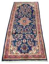 Appraisal: A Sarouk Carpet A beautiful runner with central medallion and