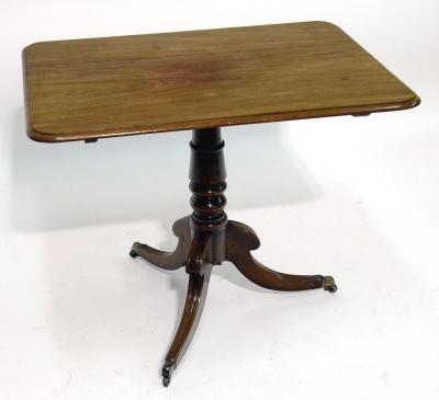 Appraisal: A MAHOGANY BREAKFAST TABLE of rounded oblong form the moulded