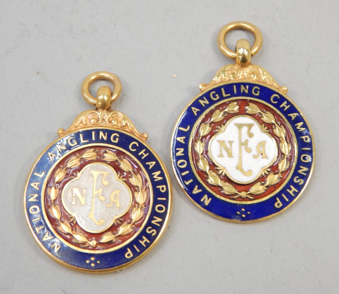 Appraisal: Two ct gold 'National Angling Championship' medals decorated with white