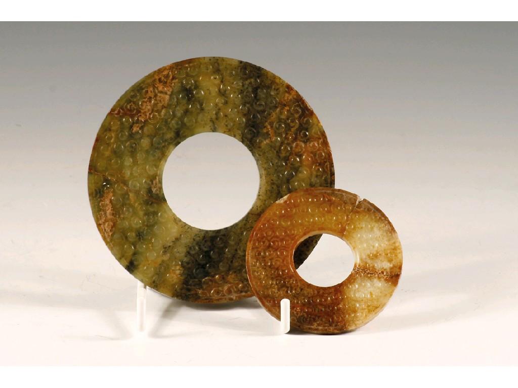 Appraisal: TWO CHINESE SPINACH JADE BI-DISCS with repeating scroll decoration the