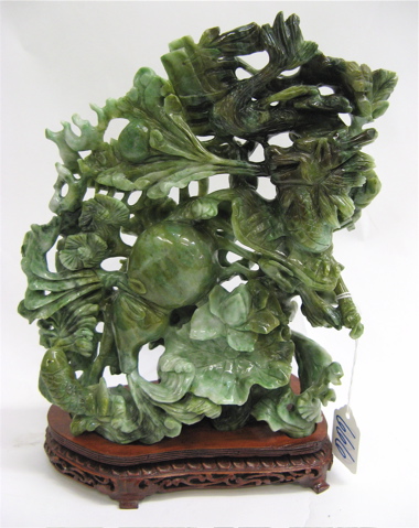 Appraisal: HAND CARVED JADE SCULPTURE Chinese th century The green jade