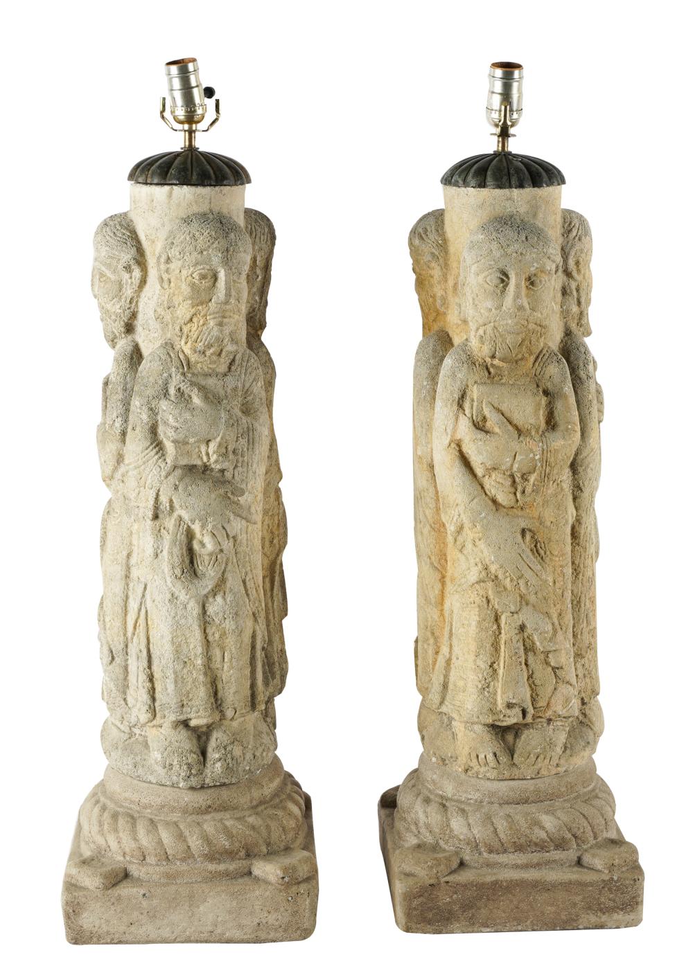 Appraisal: PAIR OF GRAND TOUR FIGURAL CARVED STONE PILLARSconverted into lamps