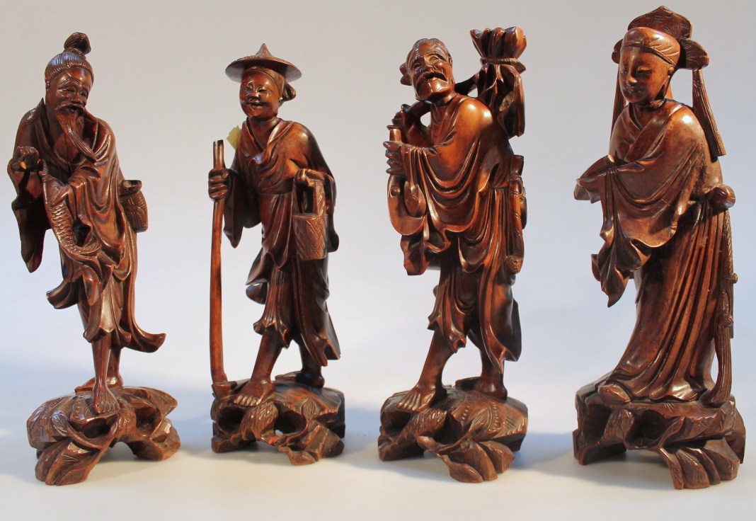 Appraisal: Four various Chinese Qing period hardwood carved figures to include