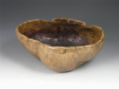 Appraisal: An th century Scandinavian burr wood bowl the underside stamped