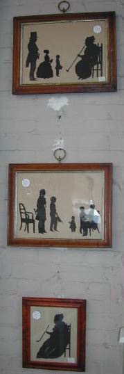 Appraisal: Group of Three Framed Black-Paper Silhouettes consisting of a large