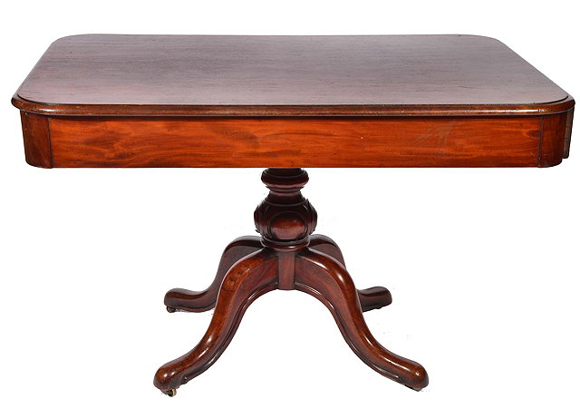 Appraisal: A TH CENTURY MAHOGANY RECTANGULAR TOPPED CENTRE TABLE with frieze