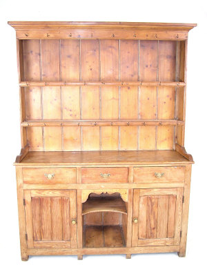 Appraisal: A Georgian pine kitchen dresser the moulded cornice above two