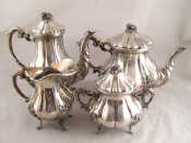 Appraisal: A four piece Italian white metal tests standard silver tea