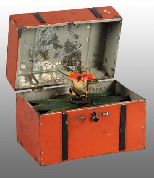 Appraisal: Tin Hand-Painted Singing Bird in Trunk Wind-Up Toy Description German